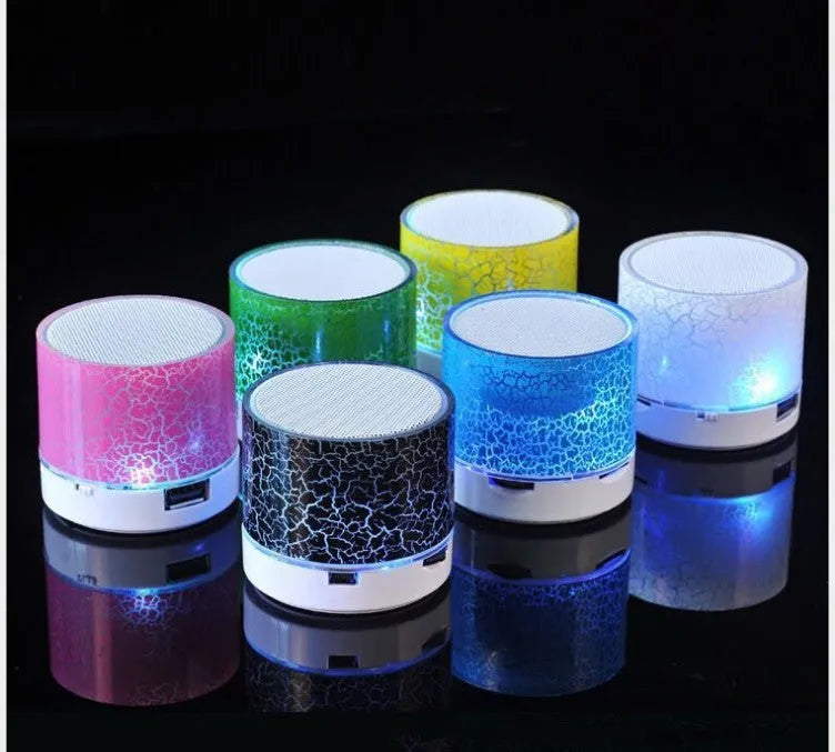 Mini portable card Bluetooth speaker in white with waterproof plastic shell, radio and MP3 support