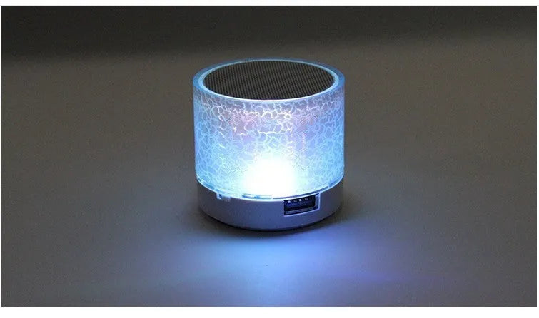 Mini portable card Bluetooth speaker in white with waterproof plastic shell, radio and MP3 support