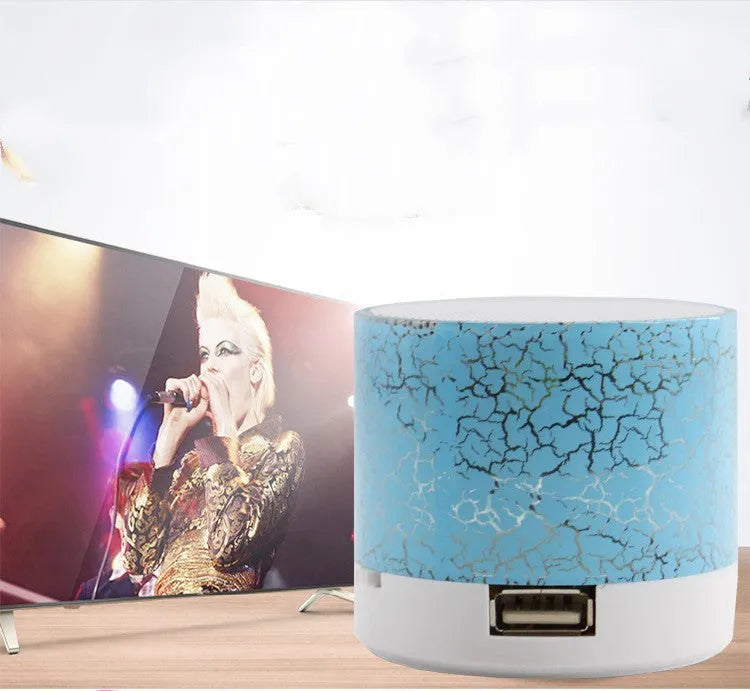 Mini portable card Bluetooth speaker in white with waterproof plastic shell, radio and MP3 support