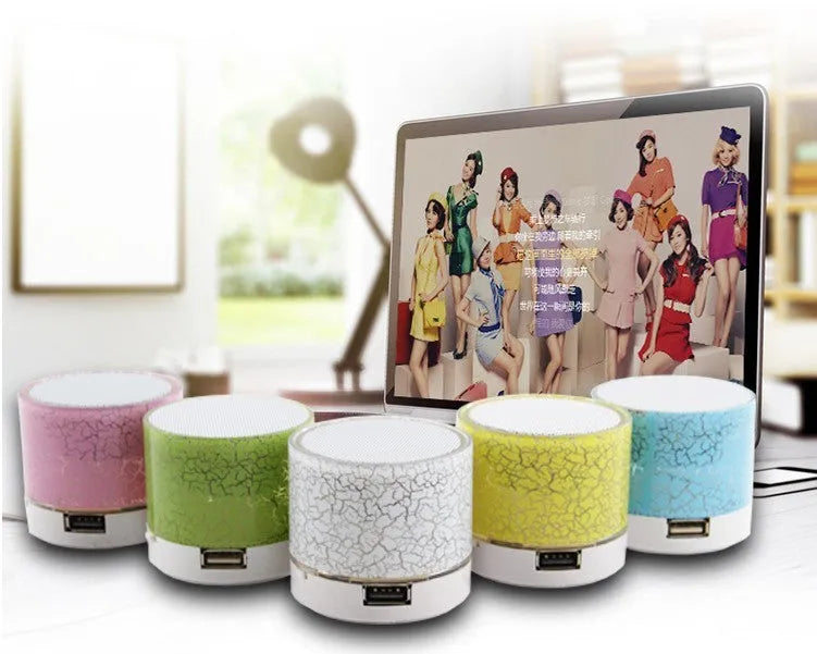Mini portable card Bluetooth speaker in white with waterproof plastic shell, radio and MP3 support
