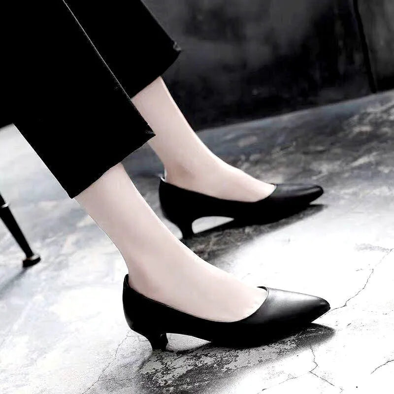 Silver and black women's wedding shoes with crystal details and different heel heights.