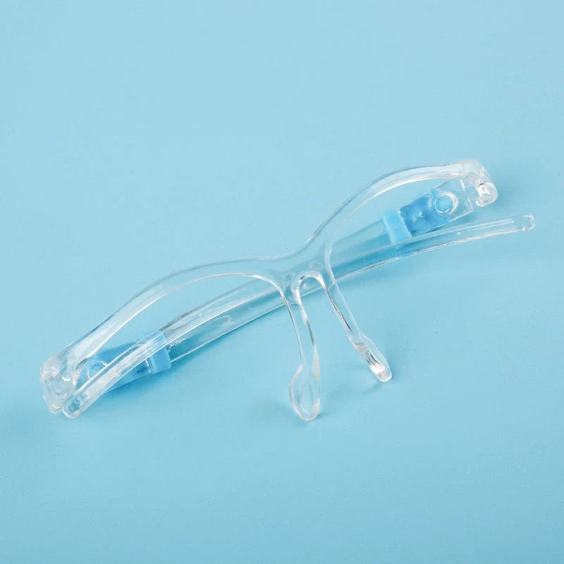 Head-mounted anti-fog and anti-spray mask in blue, green, and pink with replaceable lenses