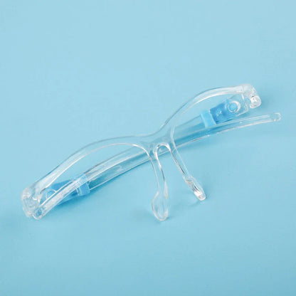 Head-mounted anti-fog and anti-spray mask in blue, green, and pink with replaceable lenses