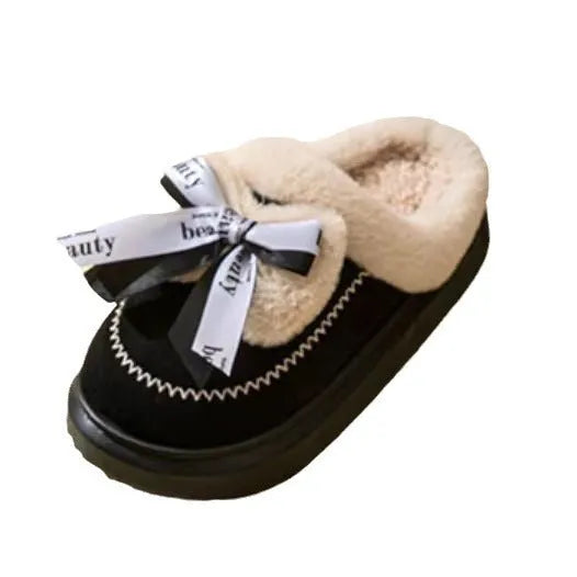 Beige women's ribbon bow half slipper with suede upper and thick sole on a neutral background