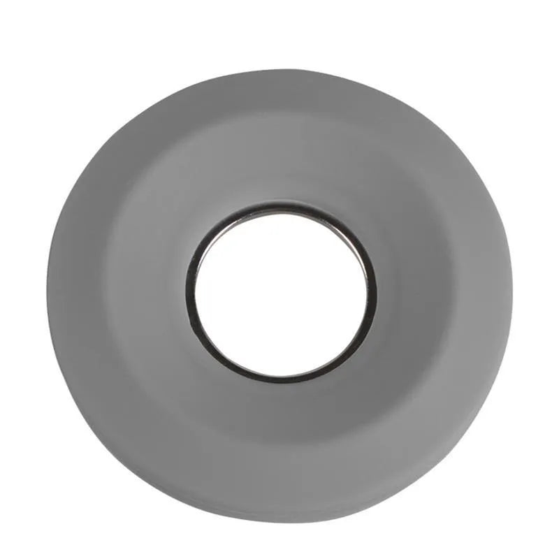 Donut-shaped silicone cord reel with suction cup base and magnet ring for organising cables