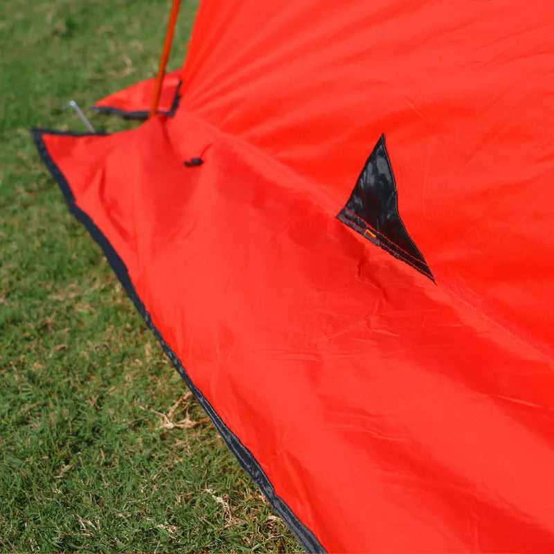 Ultralight anti-storm camping tent 2-person red double-layer with aluminium poles pitched outdoors