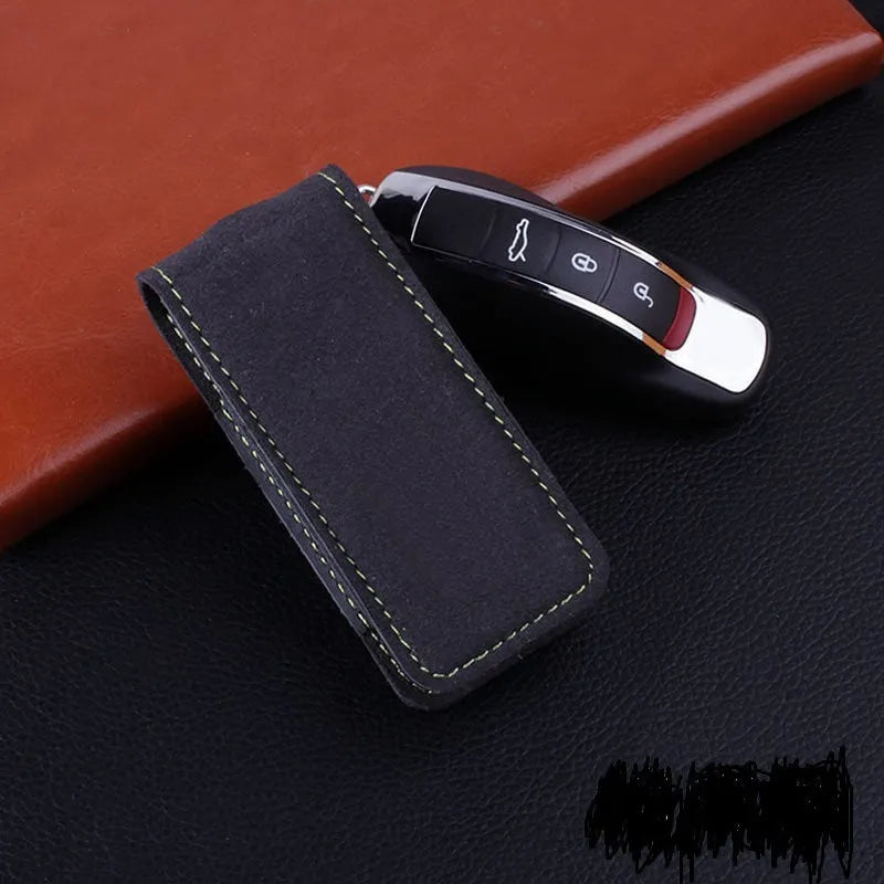 Cow leather key case for Porsche with belt buckle closure in black colour