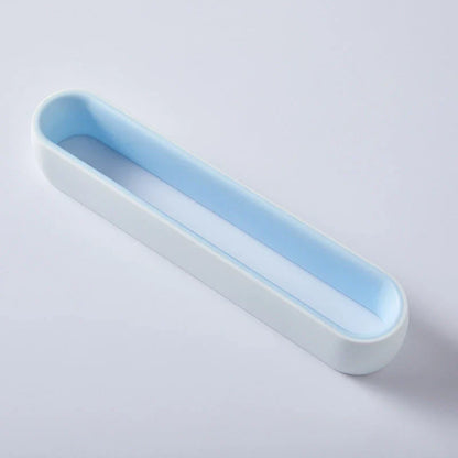 Wall-mounted bathroom slippers in pink, blue, and grey, made from 100% new plastic materials