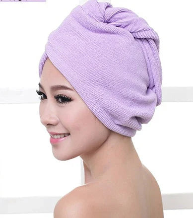 Absorbent microfiber hair turban in various vibrant colours, designed for fast and convenient drying