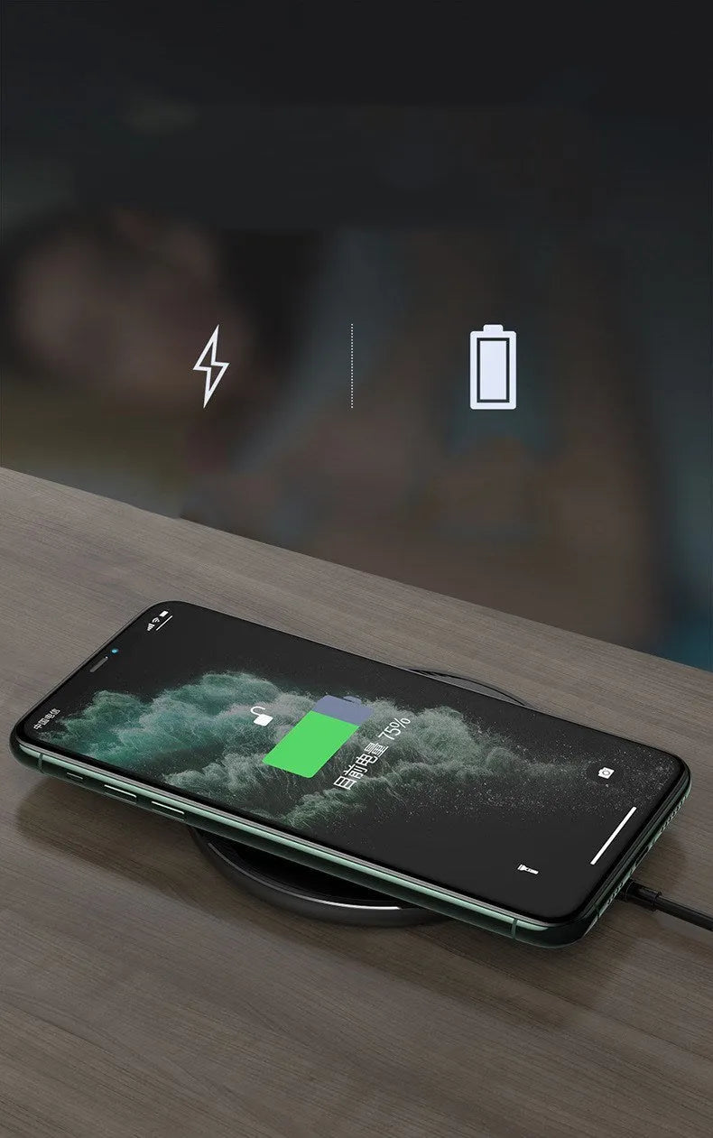 Black Kuulaa wireless disc phone charger with Micro USB port and LED indicator light