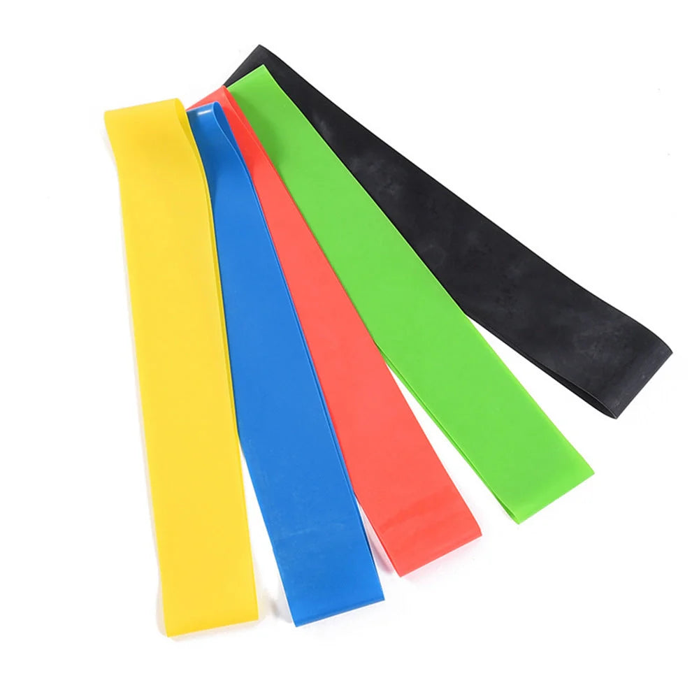 Set of five colour-coded resistance bands for yoga and fitness training, with storage bag
