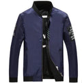 Reversible men's flight jacket showing striped and solid sides with zipper closure