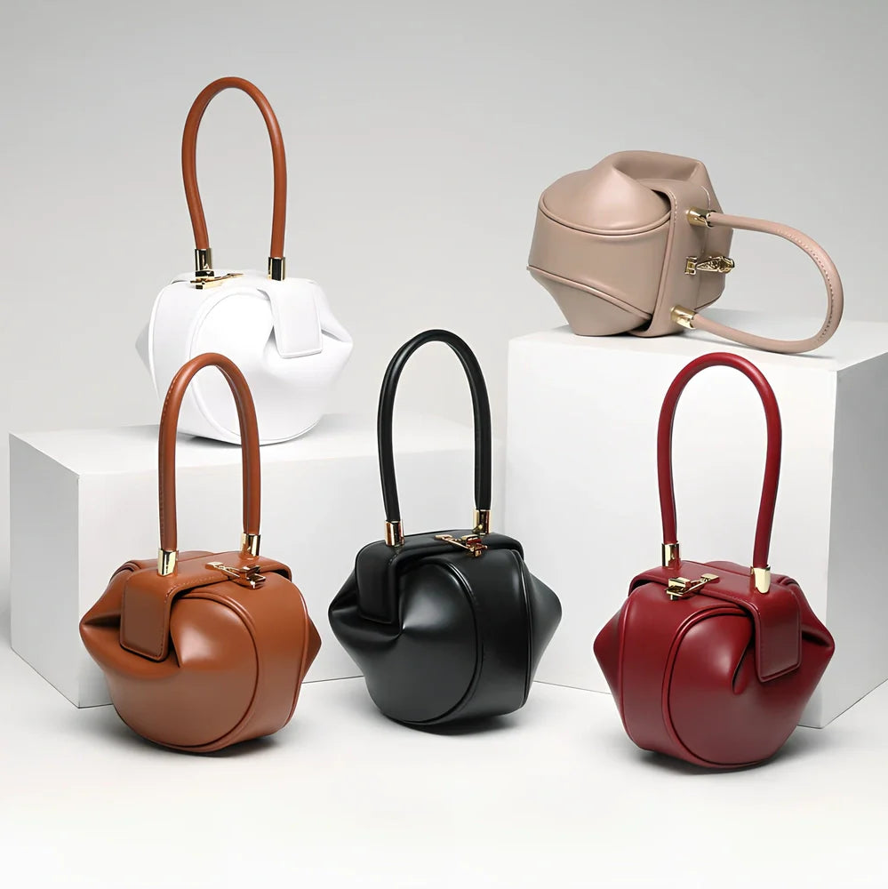 Women's cowhide leather tote bag in tramp shape with single handle and buckle, available in apricot, black, and other colours, big size 35cm x 40cm