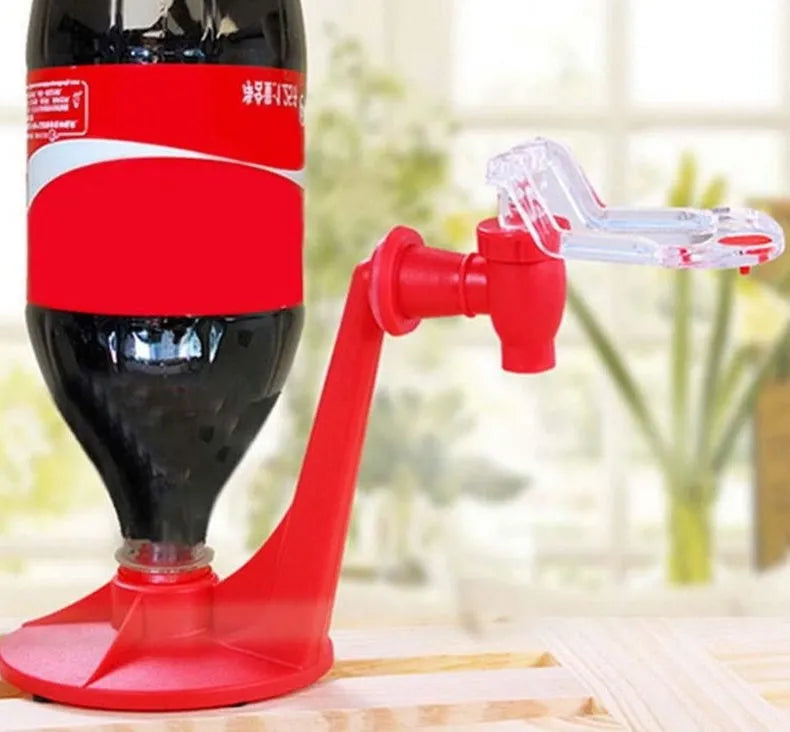 Red plastic Magic Tap soda dispenser for 2-liter bottles with push-button mechanism