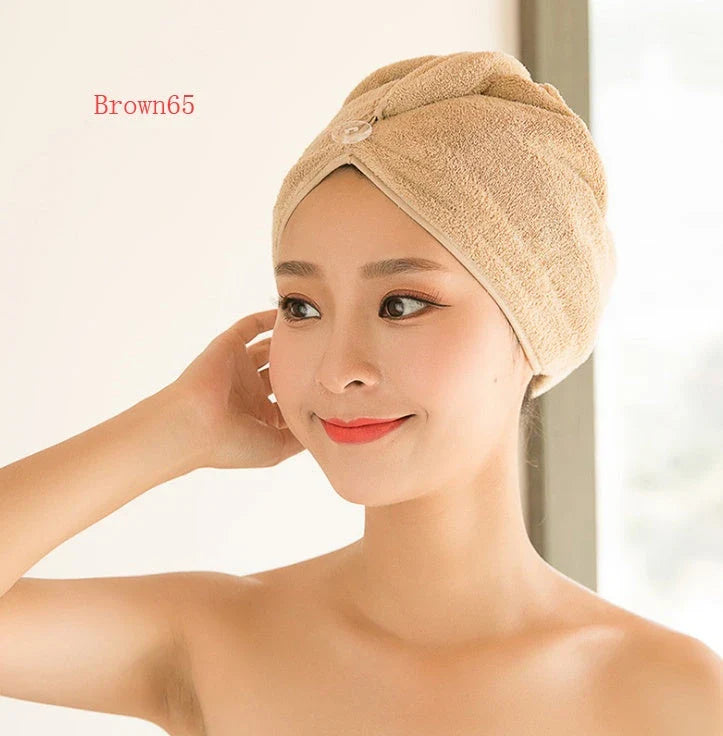 Absorbent microfiber hair turban in various vibrant colours, designed for fast and convenient drying