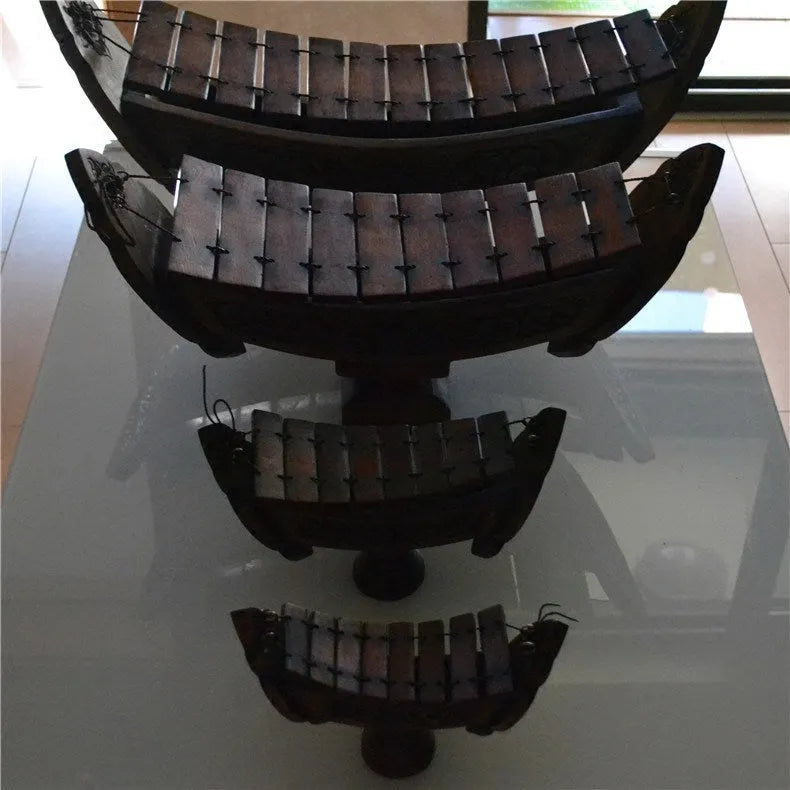 Brown wooden hand xylophone decorative pendant measuring 27x16cm in Southeast Asian style