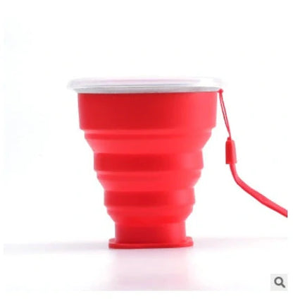 Collapsible stainless steel travel water cup showing expanded and compressed states