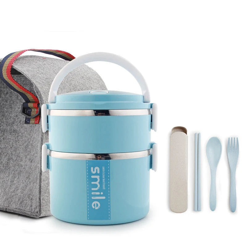 Stainless steel lunch box with built-in spoon, leak-proof design, in green, pink, and blue