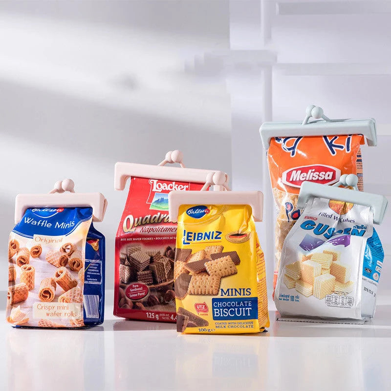 Push-button plain food bag sealing clips in blue and pink