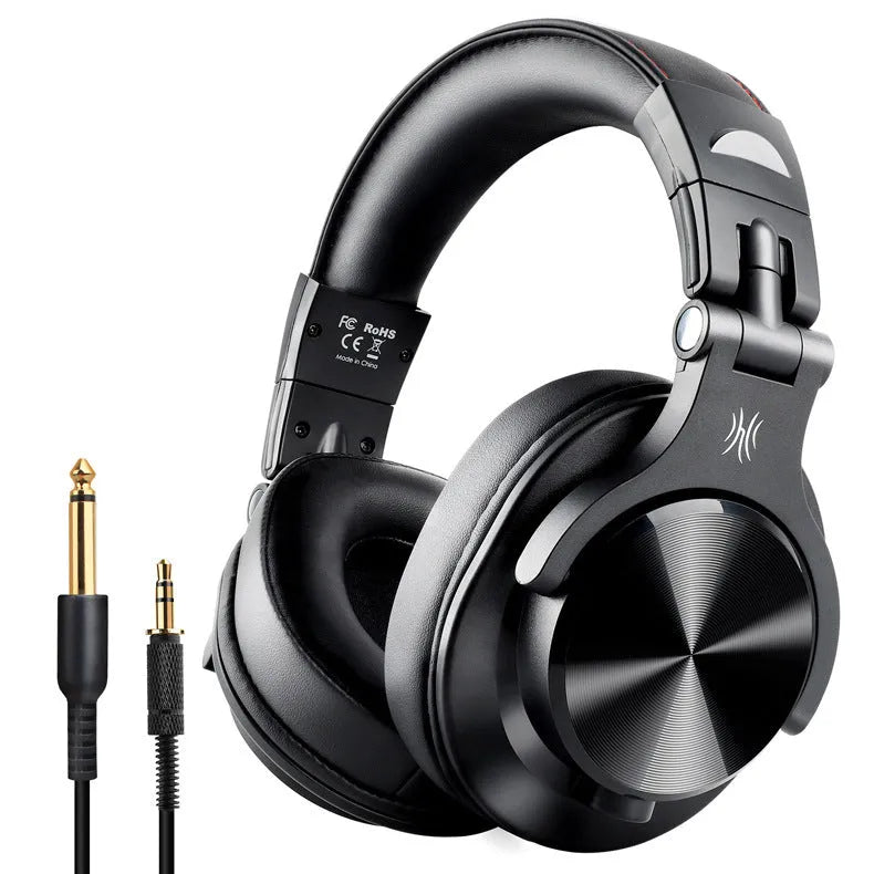 Head-mounted wireless Bluetooth monitor headset in black with 40mm speaker and coiled audio cable