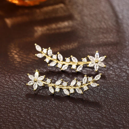 Floral diamond earrings for women in white gold, gold, and rose gold finishes