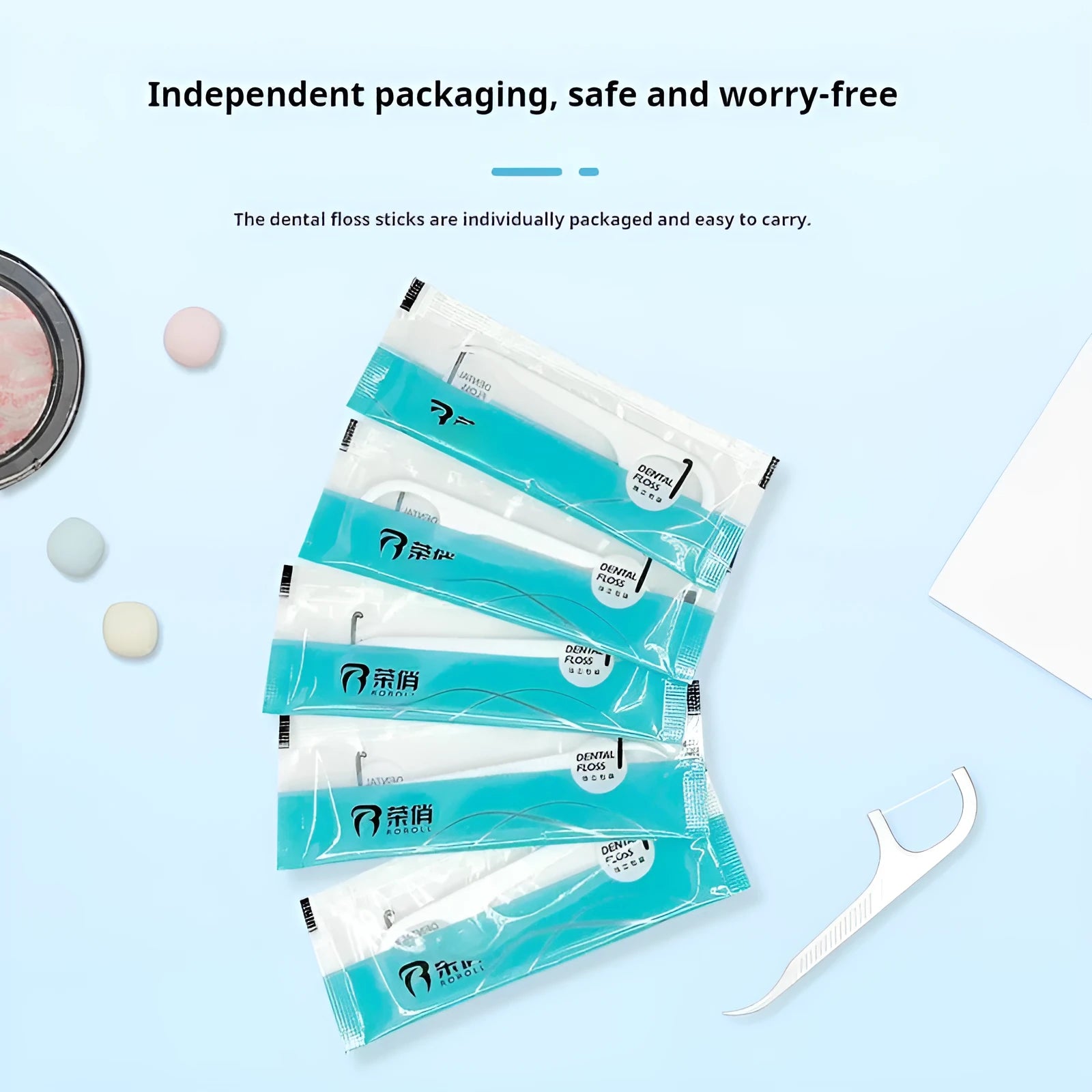 Portable plastic bag containing individually packaged high tensile disposable dental floss.