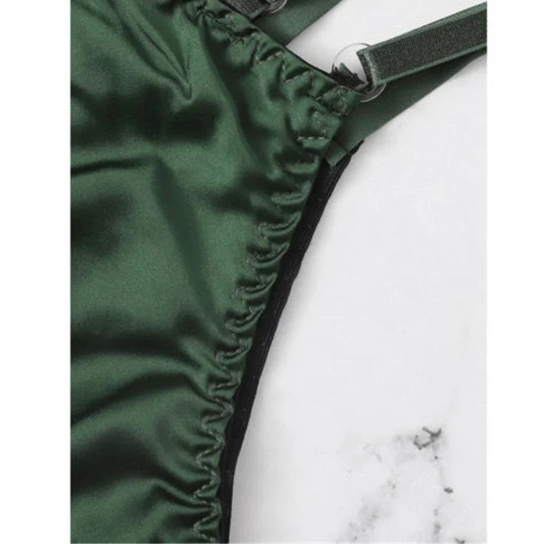 Women's black floral half-cup bra and brief set with fitted straps and back closure