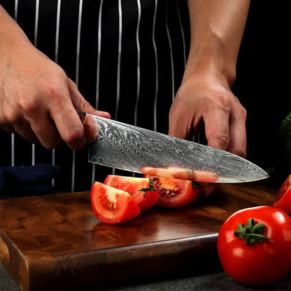 Exquisitely crafted 67-layer Damascus steel chef's knife with elegant brocade pattern and ergonomic resin-wood handle