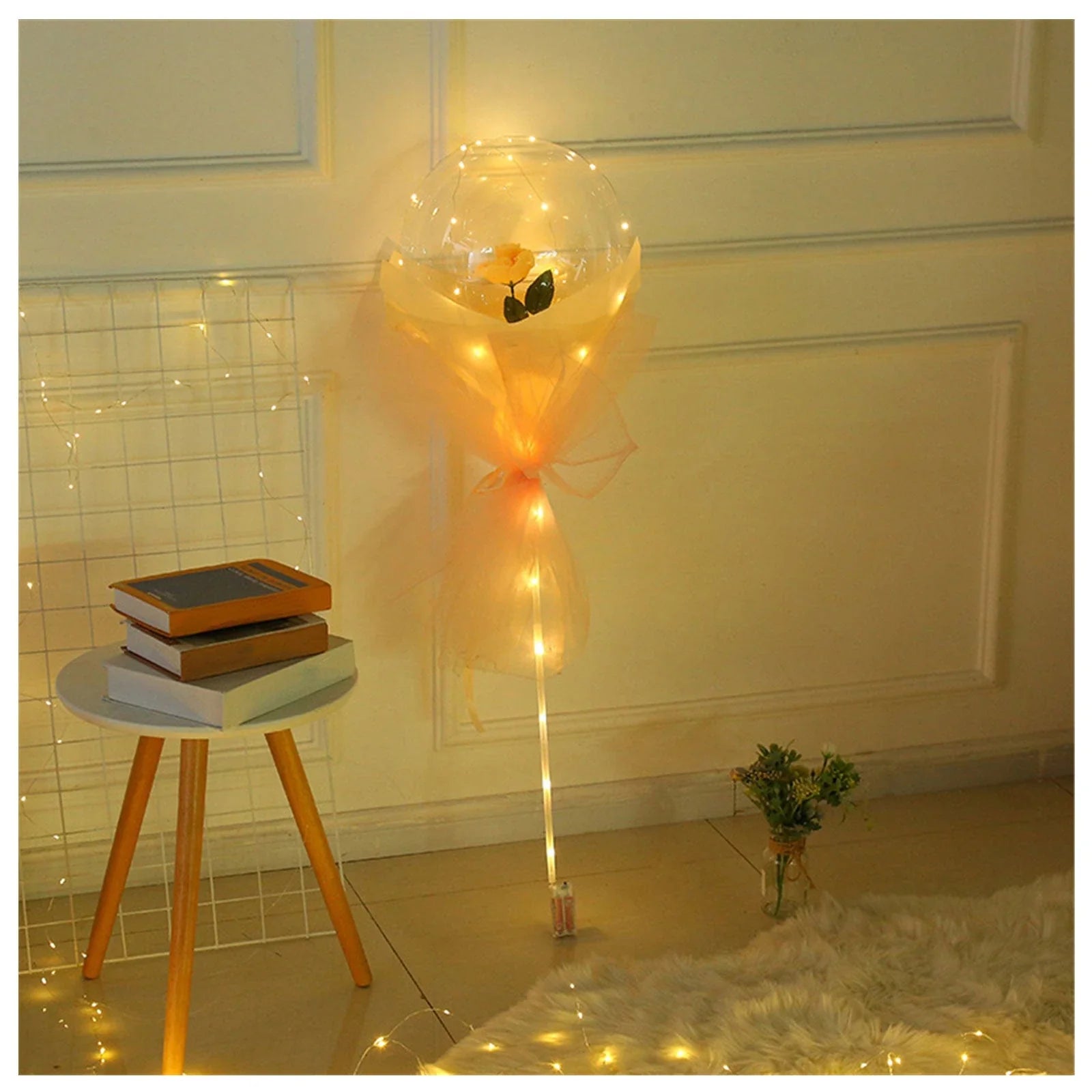 A captivating bouquet of LED-lit balloons and rose blooms, creating a mesmerizing ambiance for any celebration.