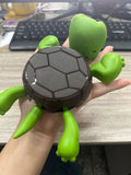 ABS plastic turtle-shaped coaster for heat insulation in a choice of four colours.