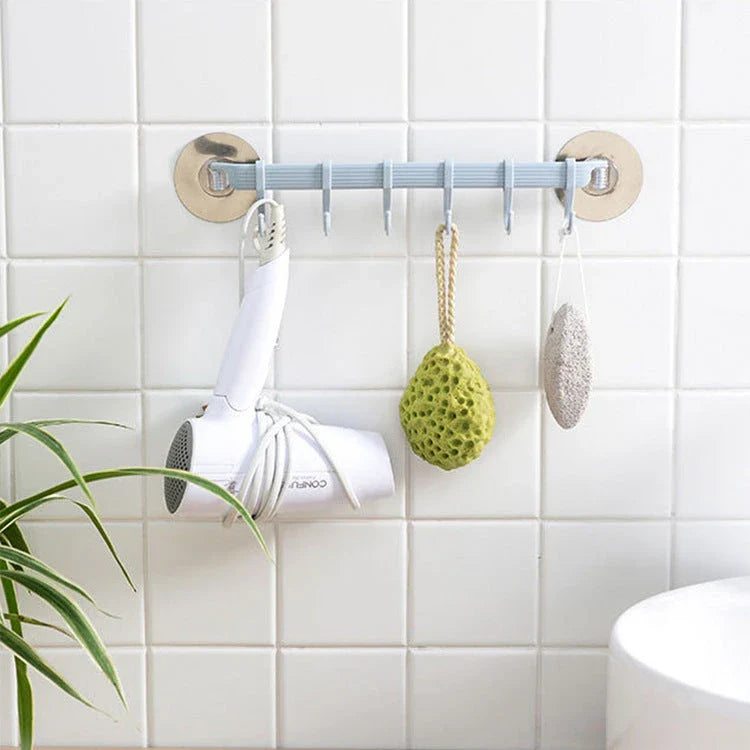 Stylish adhesive wall hooks with six rotating links for seamless, nail-free storage in the kitchen, bathroom, or any room of the Kiwi home