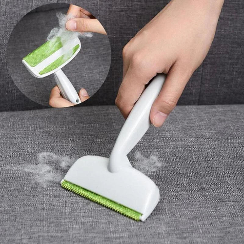 Green plush duster cleaning brush for sofa and pet hair removal