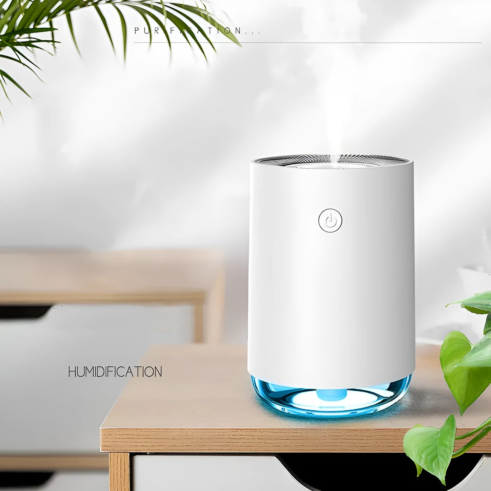 Green USB night light humidifier and essential oil diffuser with colour changing LED on a table