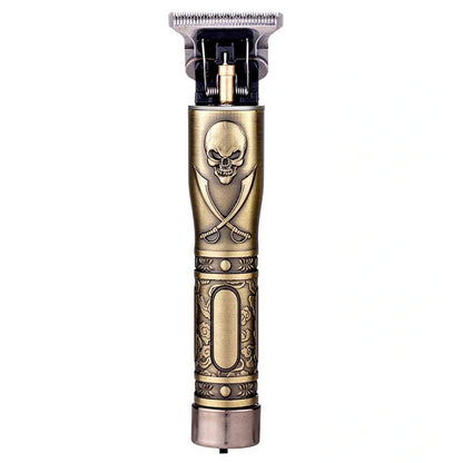 Gold skull hair clipper with USB charging port and cutting blades
