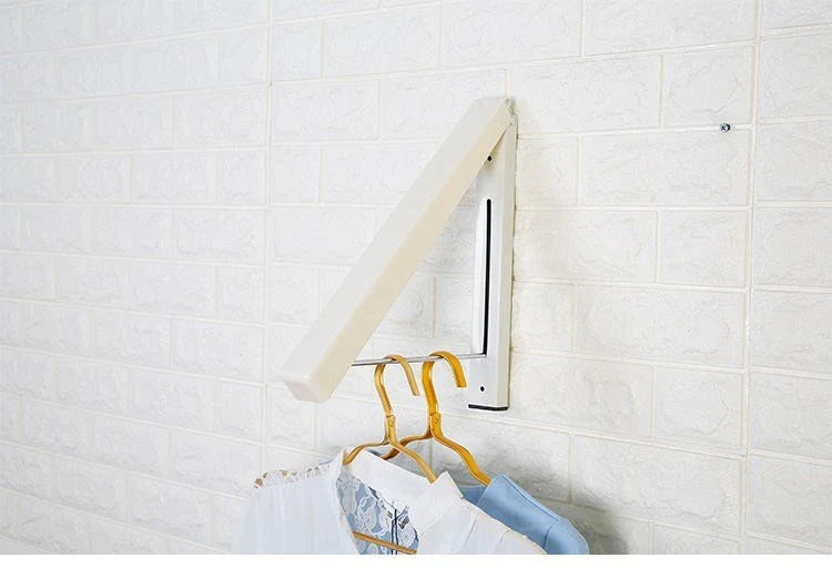 Folding clothes rack with minimalist design for saving space in small rooms and apartments