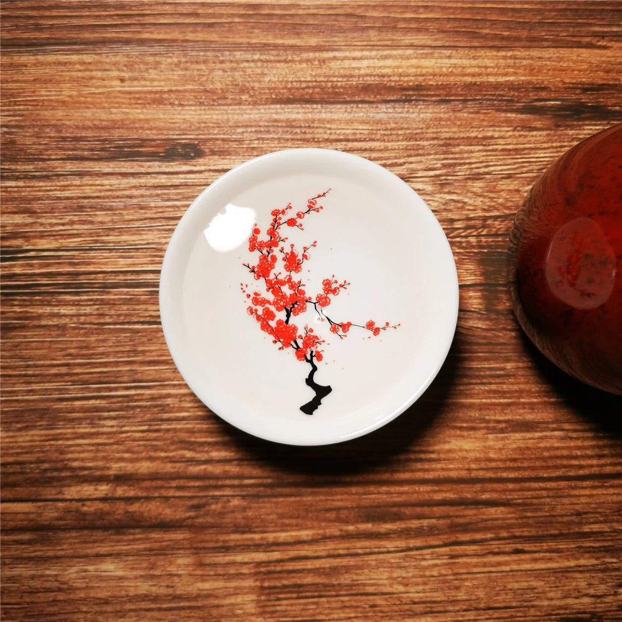 Magic Sakura Cup - Ceramic teacup with temperature-sensitive colour-changing sakura pattern