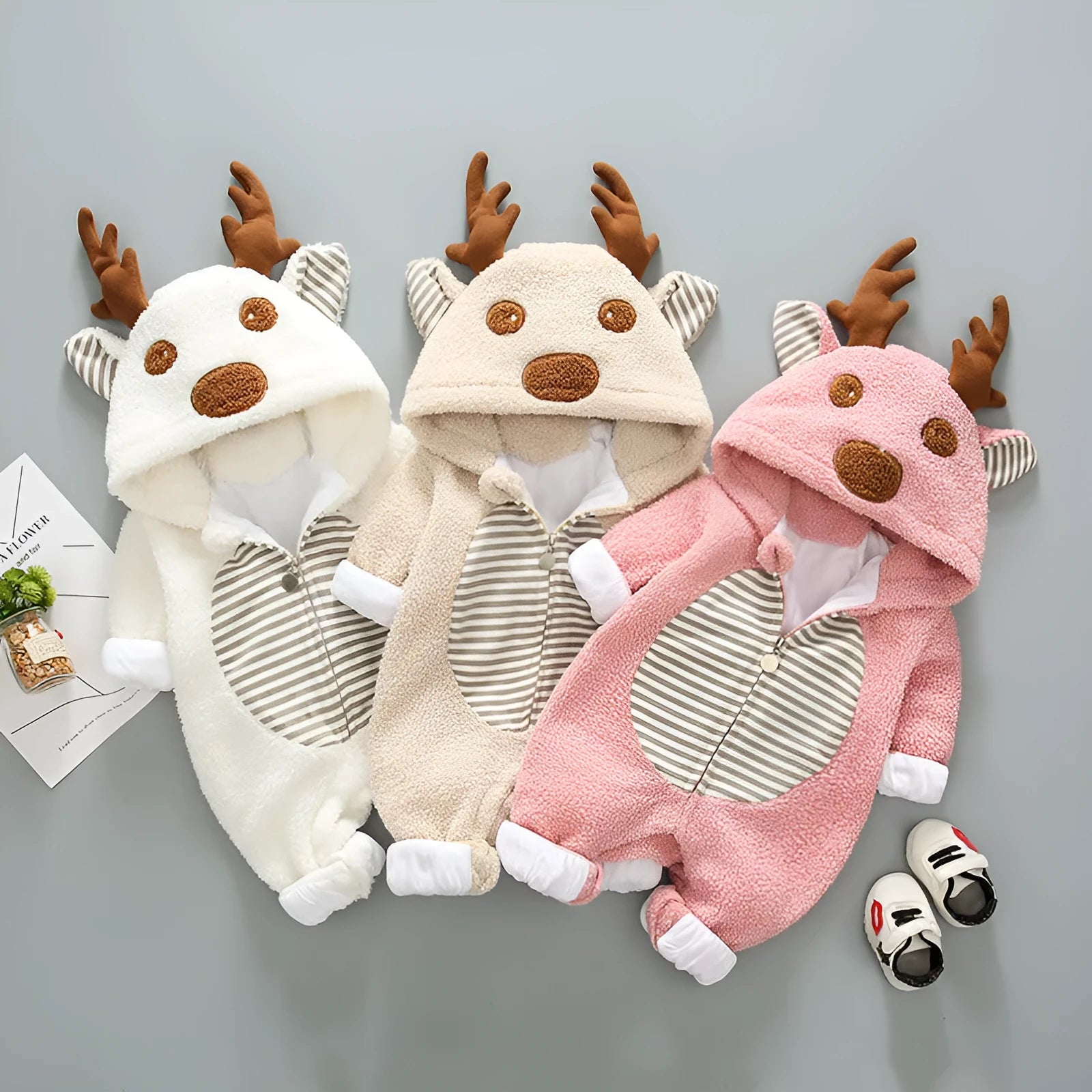 Long-sleeve baby romper with lace-up strap closure in khaki, pink, or white cotton blend fabric