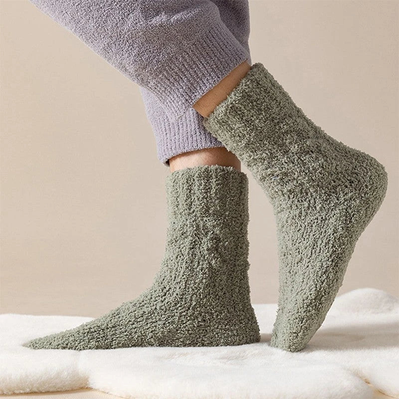 Cozy coral fleece socks in various colors, featuring soft velvet material and anti-slip design for comfort and warmth.