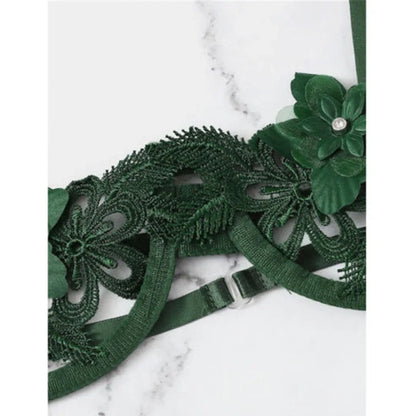 Women's black floral half-cup bra and brief set with fitted straps and back closure