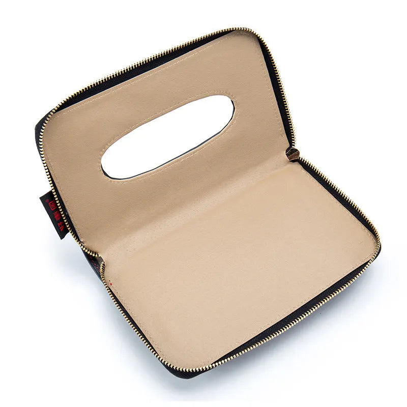 Car tissue box cover in black microfiber leather attached to a car sun visor, dimensions 21x13x2cm