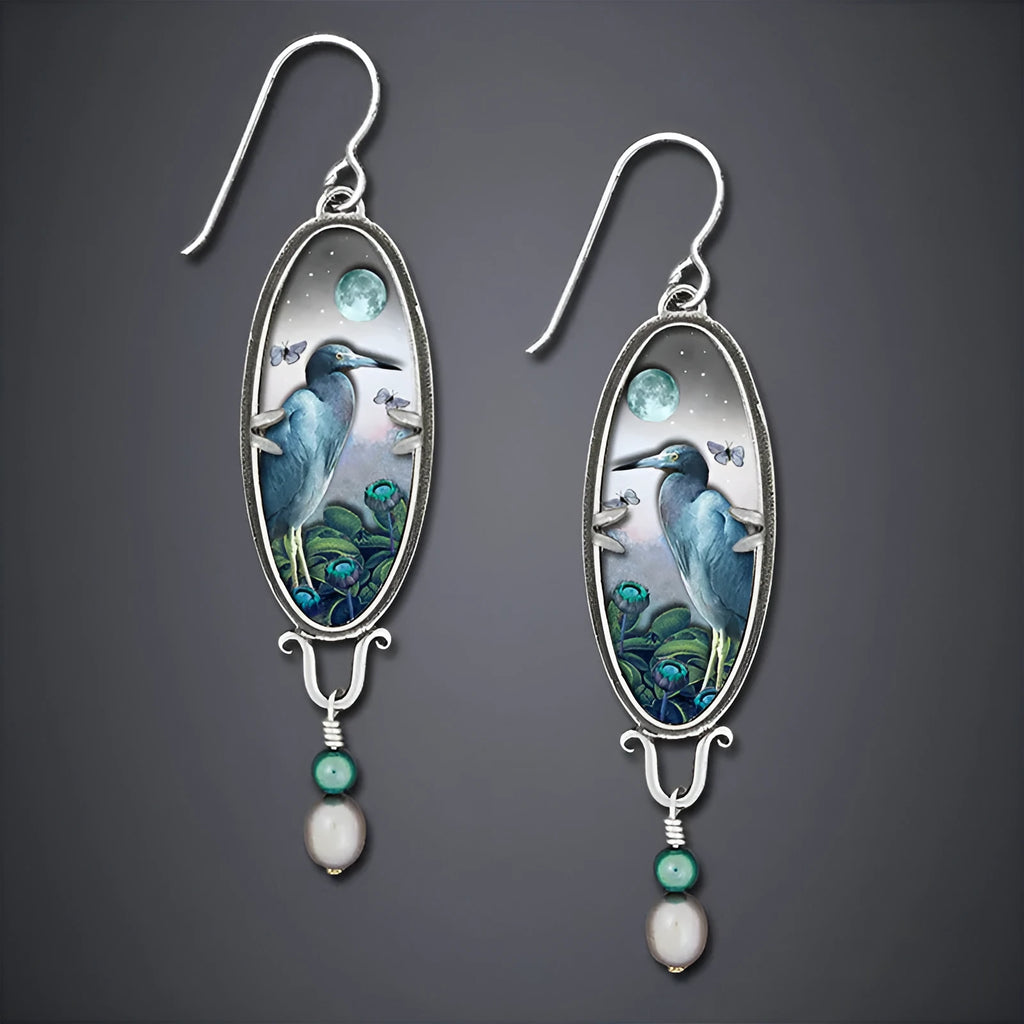 Silver electroplated metal drop earrings with retro bird and flower design