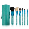 7 piece makeup brush set with synthetic and goat hair bristles and wood handles in green purple and red