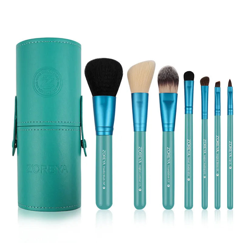 7 piece makeup brush set with synthetic and goat hair bristles and wood handles in green purple and red