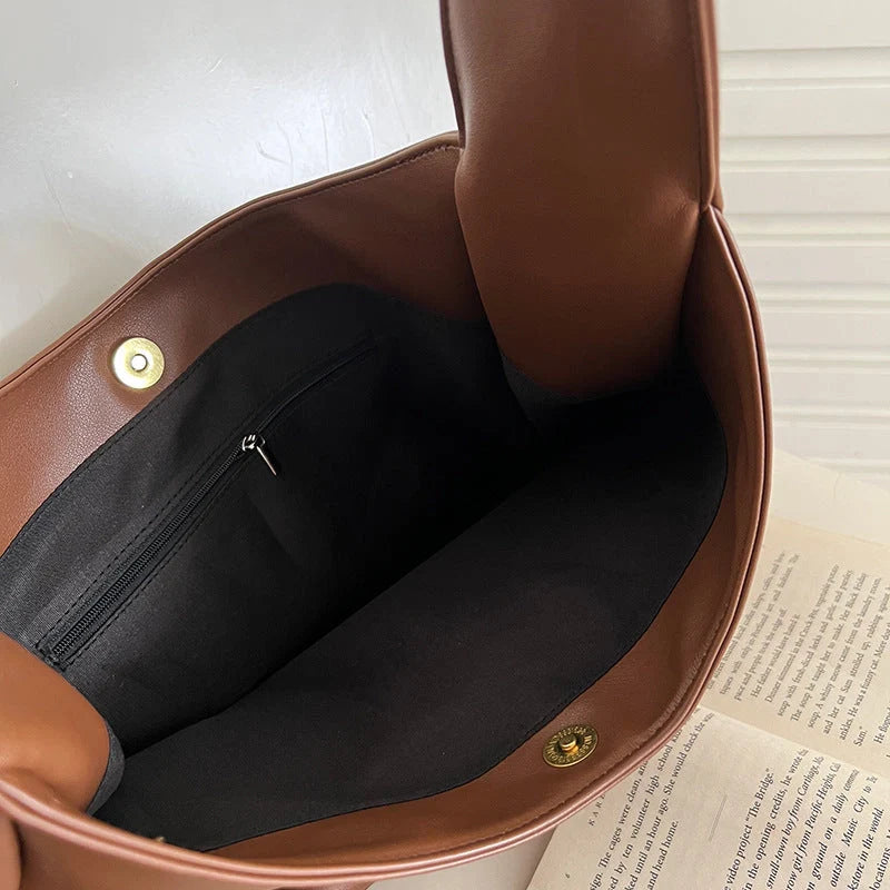 Large capacity PU tote bag for women in brown, black, and white with sewing thread detailing