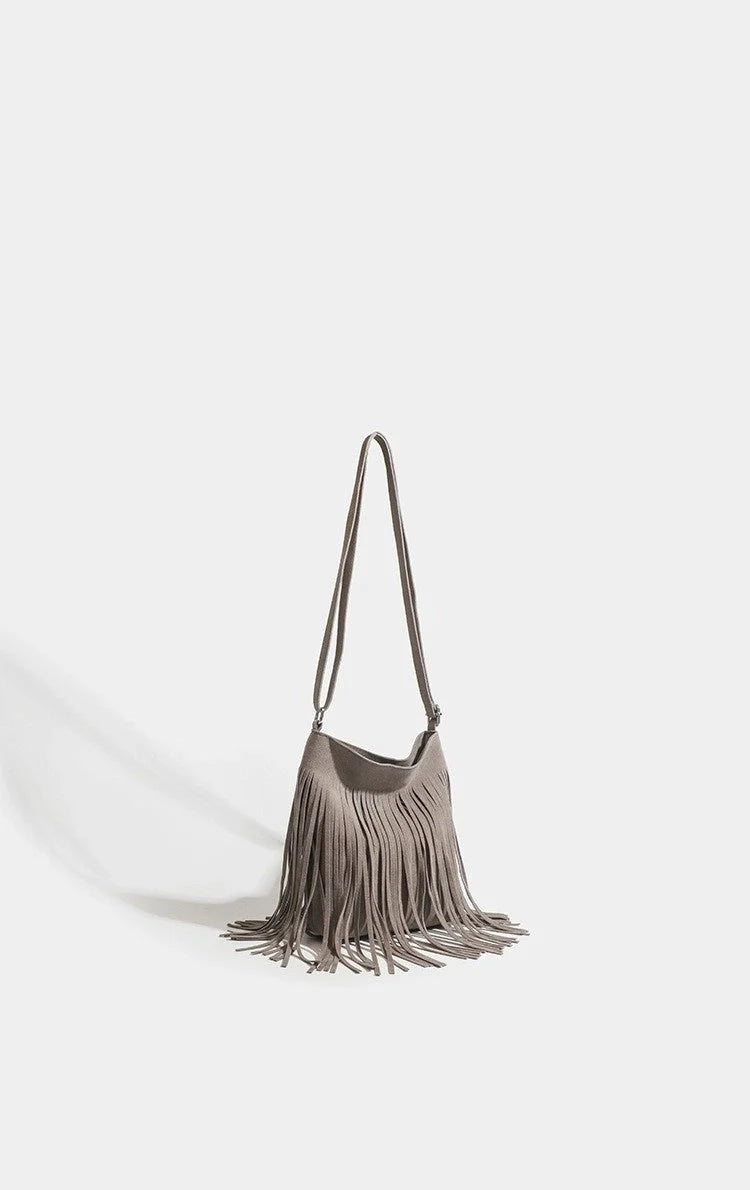 Artistic Tassel Shoulder Bag in various colours showcasing literary style and tassel detail