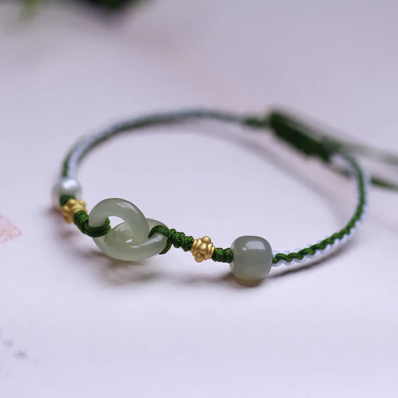 Natural Hetian jade woven bracelet with flexible wire construction and hollow out design