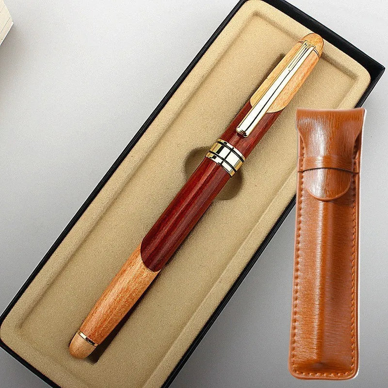 Wooden fountain pen with metal nib shown with a fabric protective pen bag