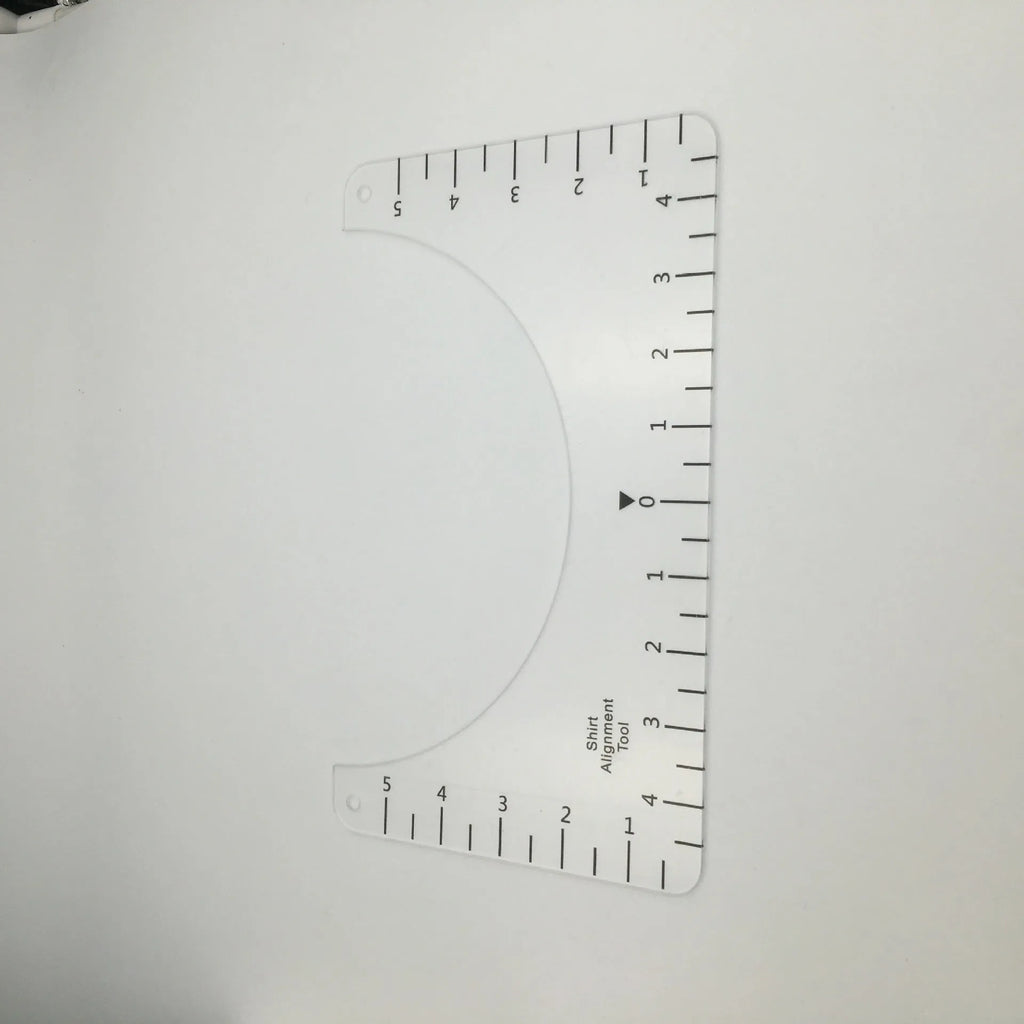 Transparent acrylic sewing ruler patch for T-shirt alignment, 10x6 inches.