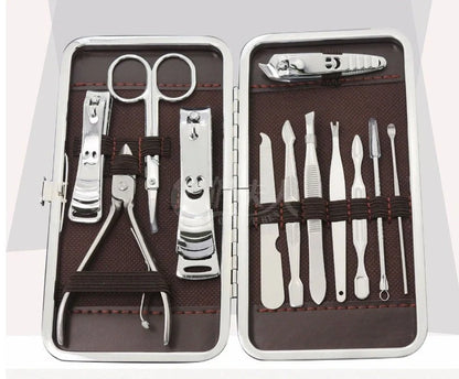 12-piece manicure kit with carbon steel tools including nail clippers and scissors in compact case