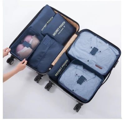 Durable waterproof packing cubes in various colors for organized, efficient travel